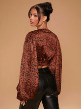 Animal Print Plunge Neck Balloon Sleeve Lace Up Top